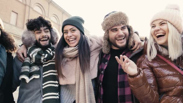 Happy friends group having fun outside