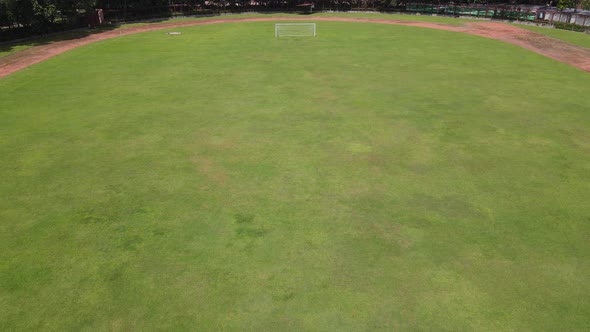 Aerial view of stadium seat in Indonesia with running track alt