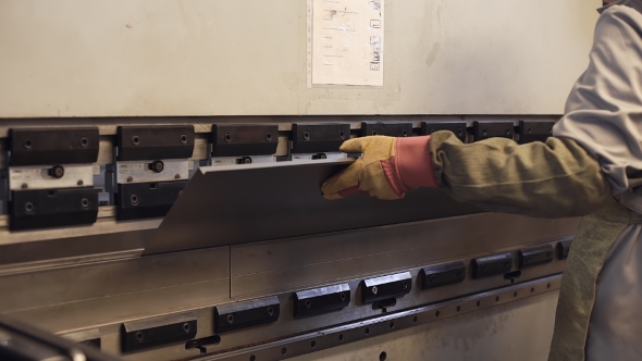 Operator Bending Metal Sheet By Sheet Bending Machine, Stock Footage