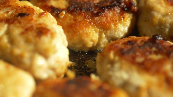 Fried Pork Meatballs Or Cutlets In Frying Pan 