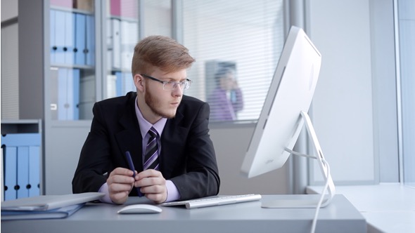 Young Manager Thinking About the Answer to the Letter alt