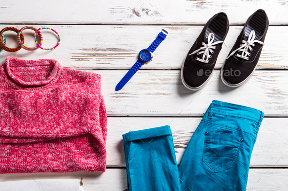 Pink sweatshirt with turquoise pants. - Stock Photo - Images