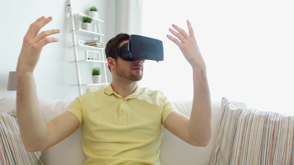 Man In Virtual Reality Headset Playing Game alt