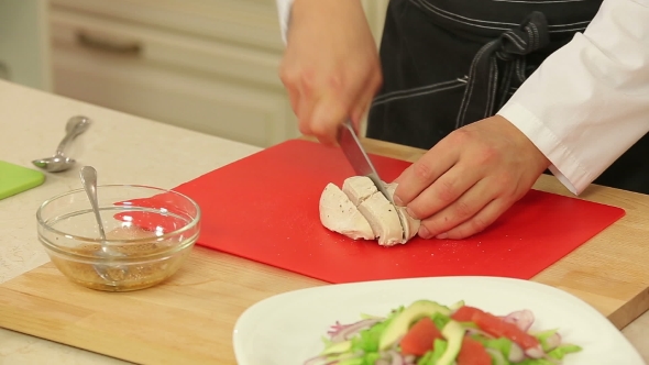 Chef Cutting Boiled Chicken Fillet For Salad