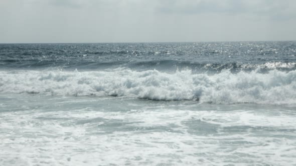 Rolling Wave Slamming on the Coastline