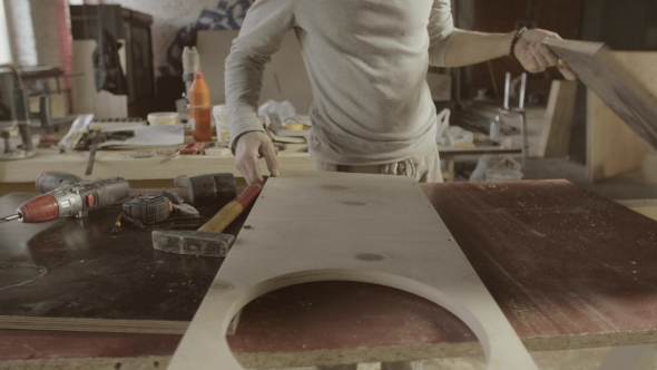 Professional Woodworker Perforate Holes In Wooden Board By Drill alt