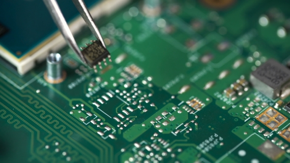 Electronic Lab Working Place With Soldering Iron And Circuit Board alt