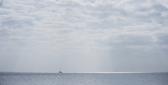 Sea, Clouds, Ships and Sun Rays on Spring