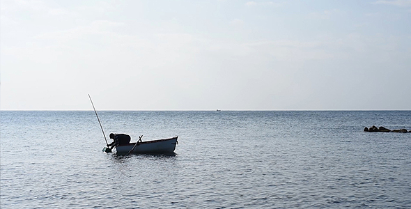 Fisherman, Little Wood Boat, Quiet Sea, Bright Sky and Horizon