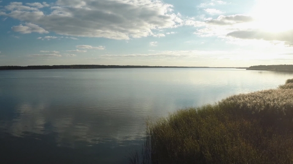 Flying Over The Evening Lake. Beautiful Nature alt
