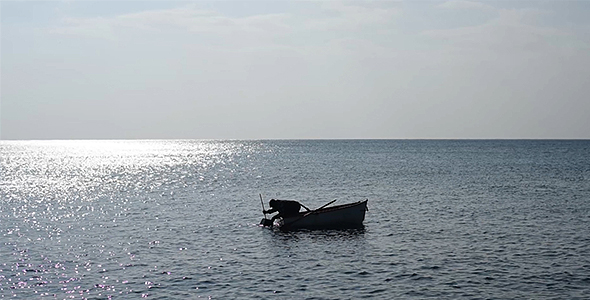 Fisherman, Little Wood Boat, Quiet Sea and Clean Sky