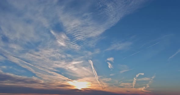 Large beautiful sun beam orange sunset sky dramatic time lapse sunset alt