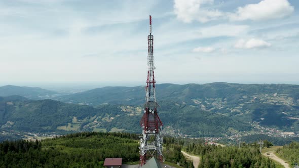 Aerial view of gsm tower transmitter on Skrzyczne Hill in Silesian Beskid and Żywieckie lake the bac alt