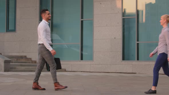 Happy Arabic Spaniard Business Man Leader Boss Manager Holding Laptop in Case Goes Meeting Caucasian alt