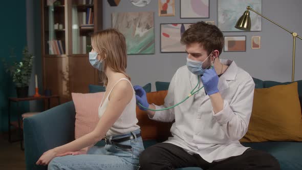 Woman and Doctor Consultation and Vaccination Process Making Covid 19 Coronavirus Vaccine at Home or alt