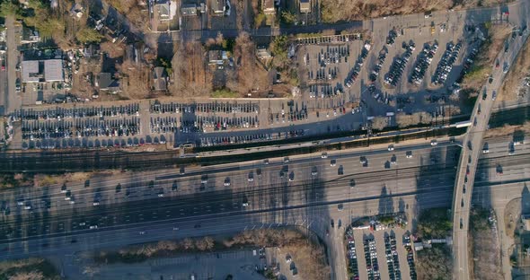 A busy highway and overpass in the early morning light alt
