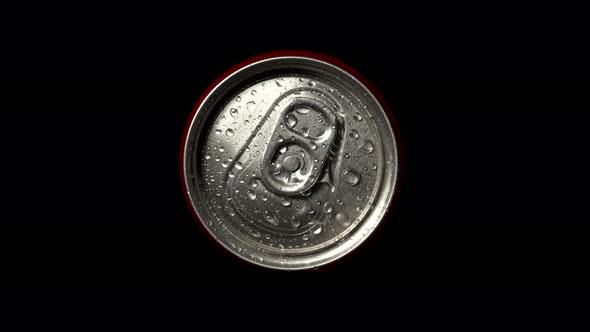 Red Can Rotate on Black Background. Top Down View of Metal Can Unopened. Bottle in Small Drops of alt