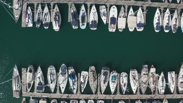 Top View of Yachts in Turquiose Water of Harbor alt