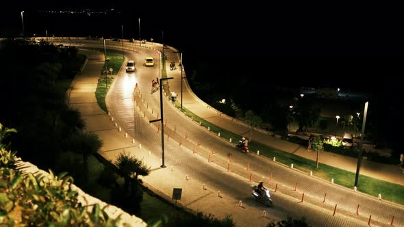 Night time traffic and people at Antalya Konyaalti
