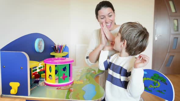 Mother Playing with her Child alt