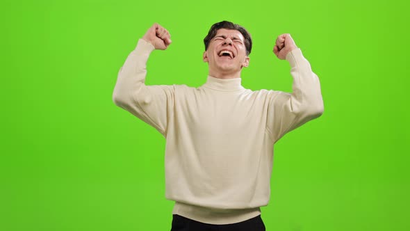 The Man is Standing and Looking at the Camera alt