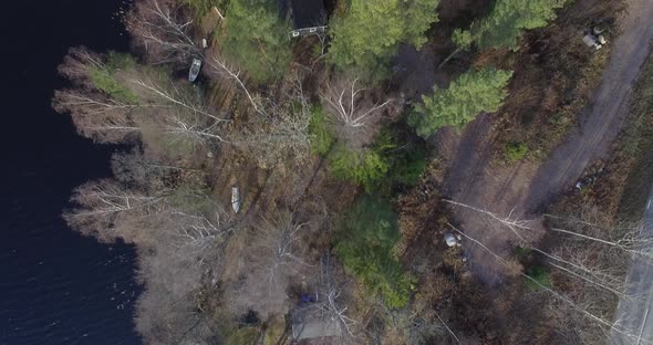 Aerial Footage Over Trees and Lake Scandinavian