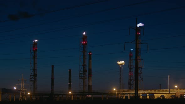 Night View of the Gas Flare at an Oil Refinery alt