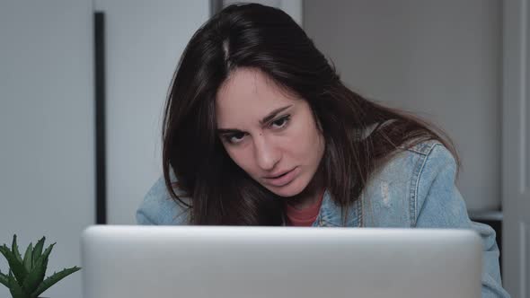 Frustration Millennial Woman Looking Bad News on Laptop Screen Thinking of Money Debt Budget Loss alt
