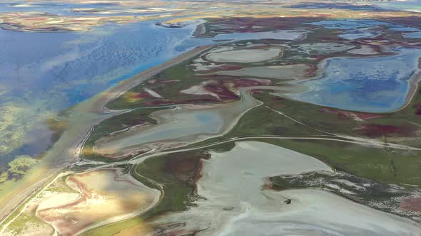 Beautiful flight in summer over salt lakes. Dry lakes. Green grass. alt