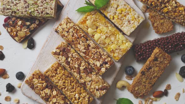 Various Kinds of Protein Granola Bars with Dry Fruits and Berries alt