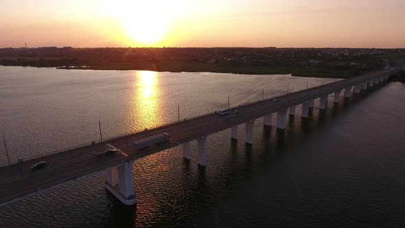 Aerial Shot of Picturesque Bridge Covering the Dnipro at Dreamy Sunset in Summer