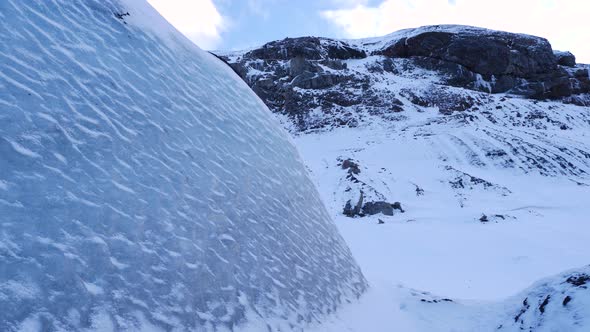 Large Blue Glacier Ice Wall In Iceland During Winter 