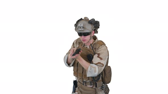 Army Man Pointing Gun in Multiple Directions Ready for Combat on White Background alt