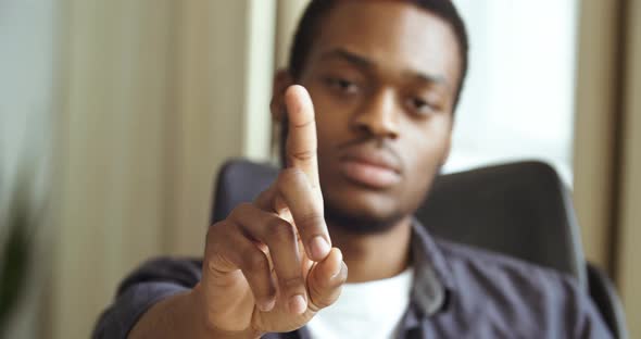 Afro American Business Man Freelance Entrepreneur Sitting at Table in Office Home Shaking His Finger alt