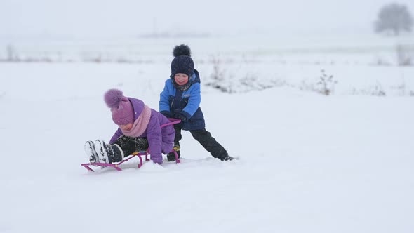 Cute kids having fun at winter holidays.