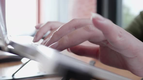 Asian freelance woman person using computer laptop for working at indoor home office alt