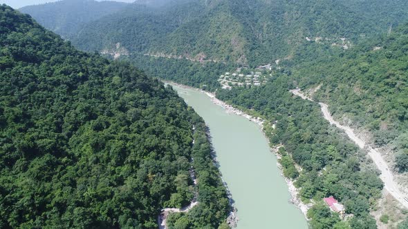 The Ganges river close to Rishikesh state of Uttarakhand in India from the sky alt