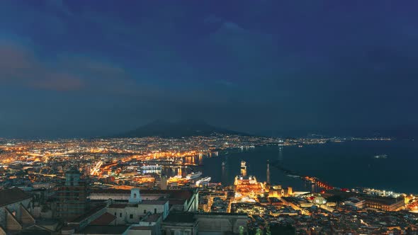 Naples, Italy. 4K Top View Skyline Cityscape In Evening Lighting Day To Night. Volcano Vesuvius