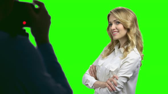 Pretty Business Lady Posing for Camera on Green Screen alt