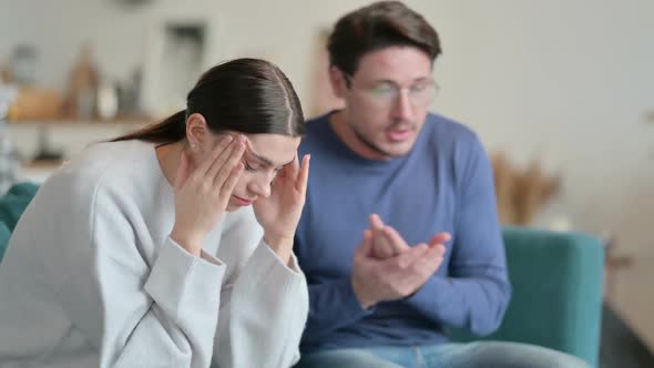 Hispanic Man Fighting with Stressed Female Partner alt