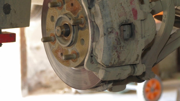 Dismantling Of Brake Disk At Auto Repair
