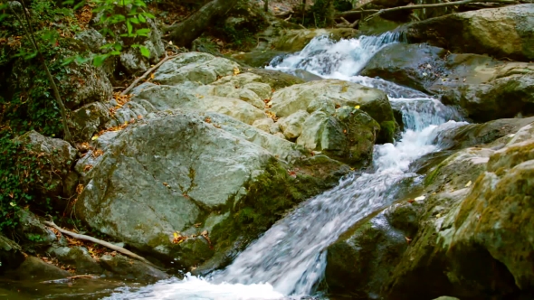 Fast Mountain River Flowing Among Stones