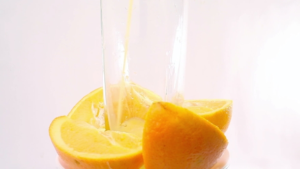 Orange Juice Rotating On White Background alt