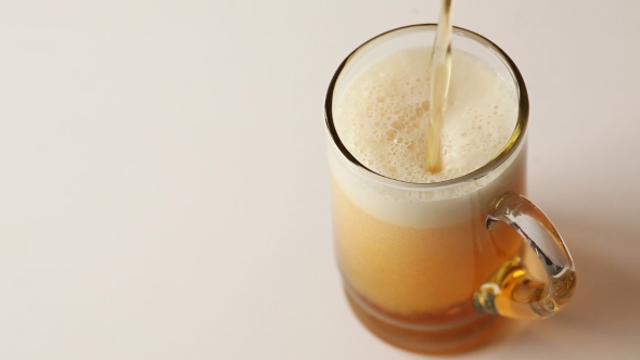  Pouring Beer Into a Glass