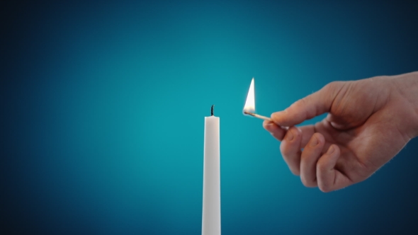 Burning Candle On a Red Background, Stock Footage | VideoHive