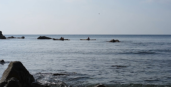 Kayaking on Mediterranean Sea under Blue Summer Sky