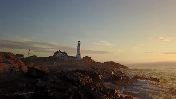 Flying Over the Ocean Past Portland Head Light  alt
