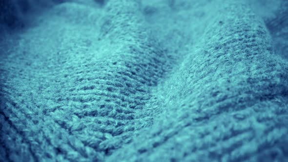 Extreme Detail View of Sheep Wool Cloth Texture Flowing in Macro Dolly Shot alt