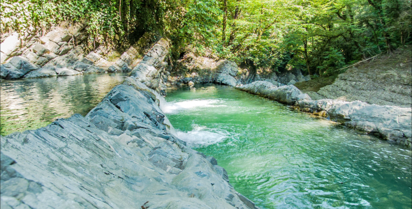 Small Lakes With A Mountain Waterfall