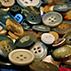 Mixed Buttons Poured Into Pile Mixed Buttons Poured Into Pile - VideoHive Item for Sale